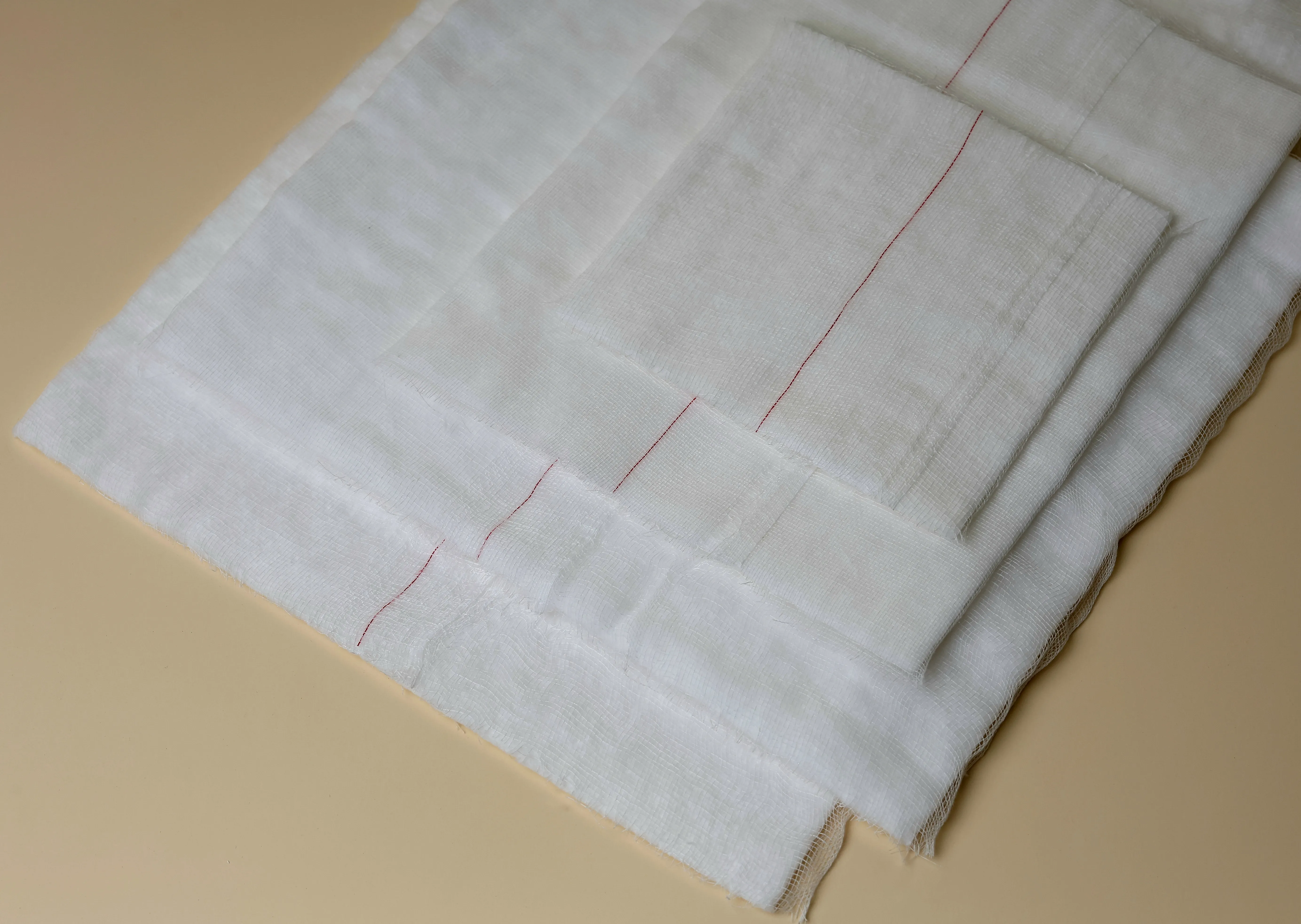 Cotton filled gauze pads