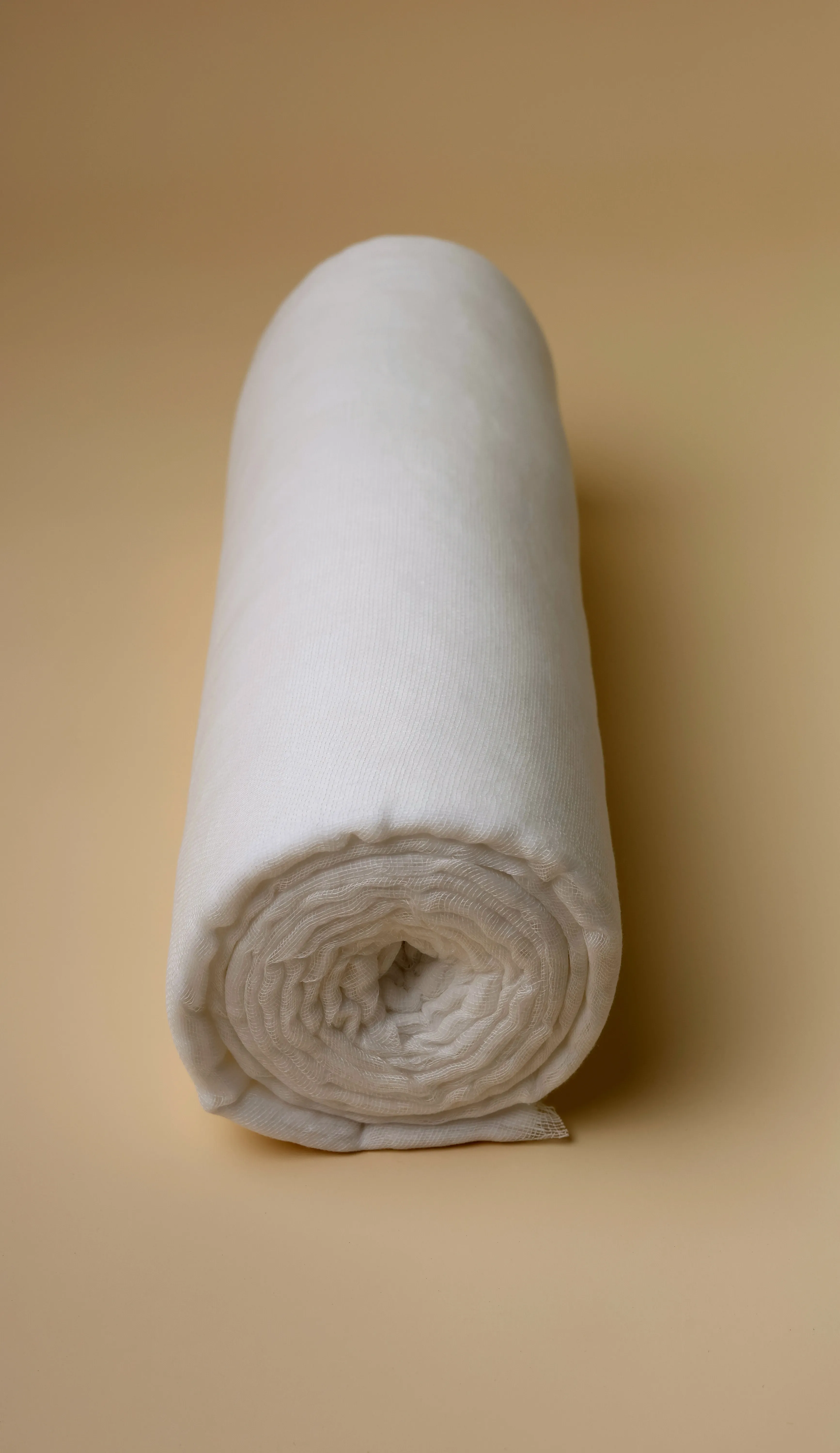 Cotton roll in gauze